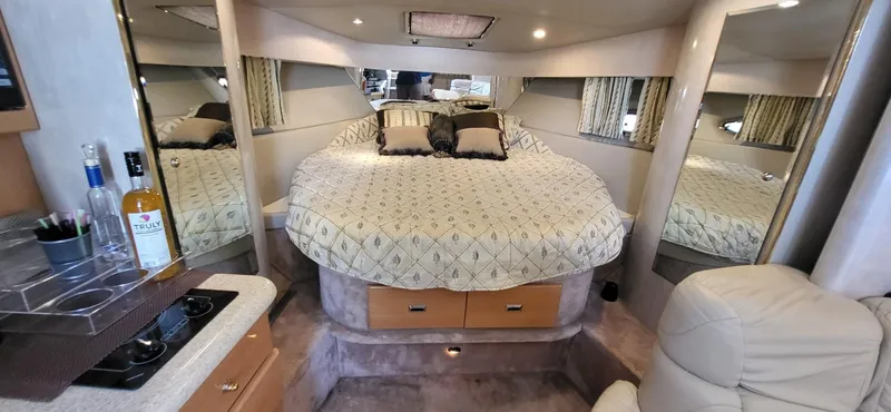 Slide: The Image of Interior of 2002 Formula 37 PC yacht with cozy bed and modern amenities. - 18