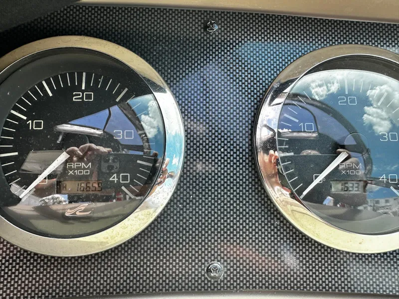 Slide: The Image of Close-up of Sea Ray 460 Sundancer 2000 boat gauges showing RPM readings. - 17