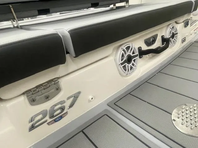 Slide: The Image of Interior of 2025 Chaparral 267 SSX boat with SSX logo and speaker detail. - 14