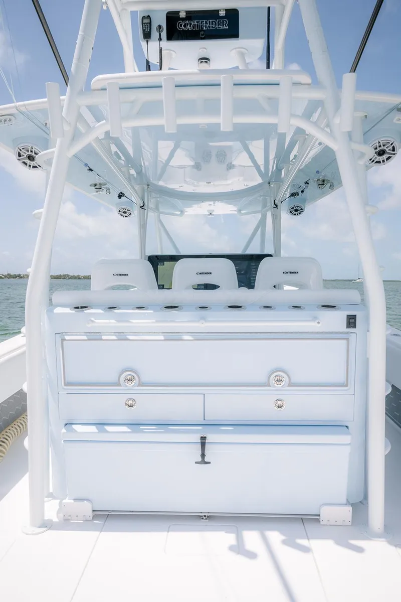 Slide: The Image of 2022 Contender 44ST boat interior with seating and storage, featuring sleek design and modern amenities. - 20