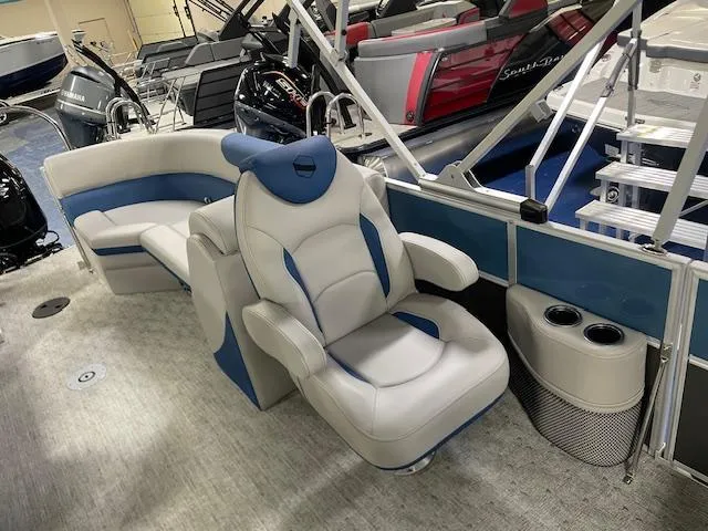 Slide: The Image of 2025 South Bay LE boat interior with plush seating and modern design. - 9