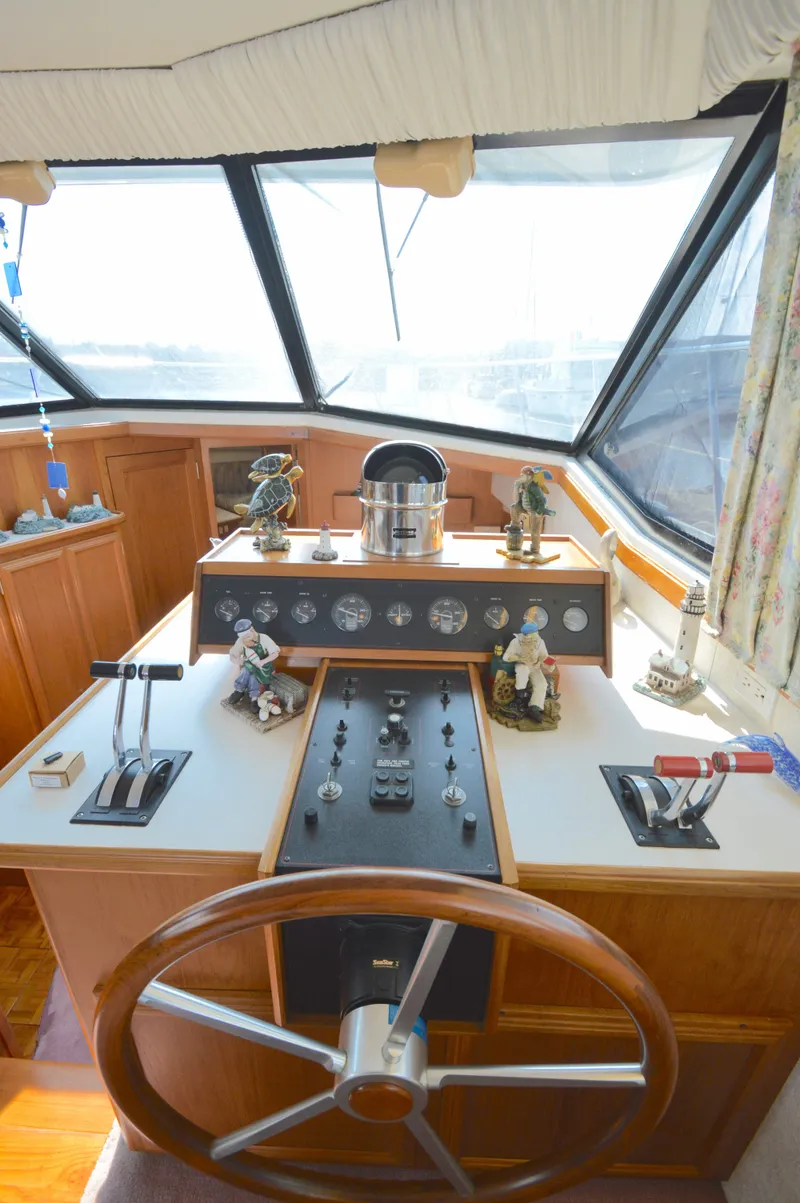 Slide: The Image of Interior helm of 1991 Carver 43 Cockpit Motoryacht with nautical decor. - 34