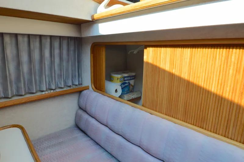 Slide: The Image of Interior of 1991 Carver 43 Cockpit Motoryacht with seating and storage. - 43