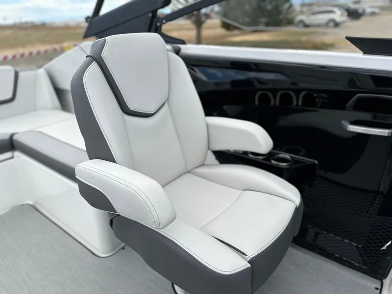 Slide: The Image of 2025 Yamaha Boats AR250 interior with modern seating and sleek design. - 14