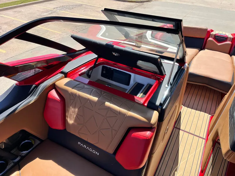 Slide: The Image of 2021 Nautique Super Air Nautique G25 Paragon interior with luxurious seating and modern dashboard. - 20