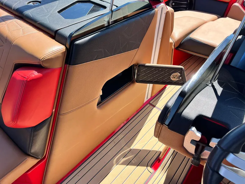 Slide: The Image of 2021 Nautique Super Air Nautique G25 Paragon interior with luxurious seating and sleek design. - 24