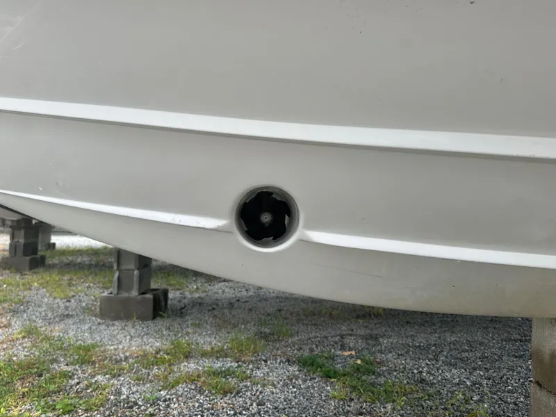 Slide: The Image of Close-up of 2020 Cobalt R5 Surf boat hull on gravel. - 2