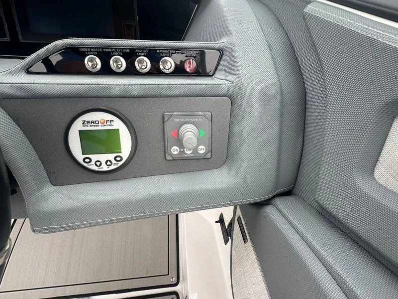 Slide: The Image of 2020 Cobalt R5 Surf boat dashboard with control panel and Zero Off display. - 6