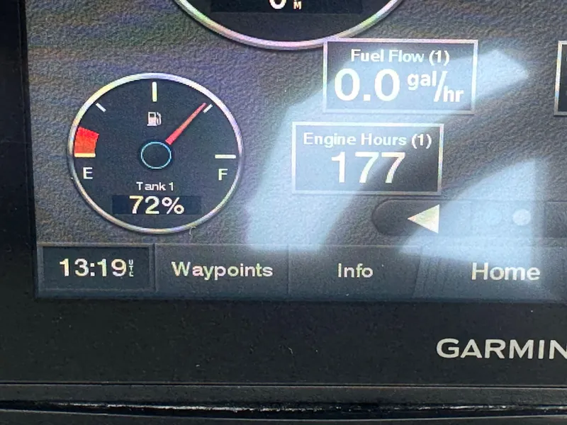 Slide: The Image of Garmin display showing fuel level, engine hours, and time on 2020 Cobalt R5 Surf. - 7
