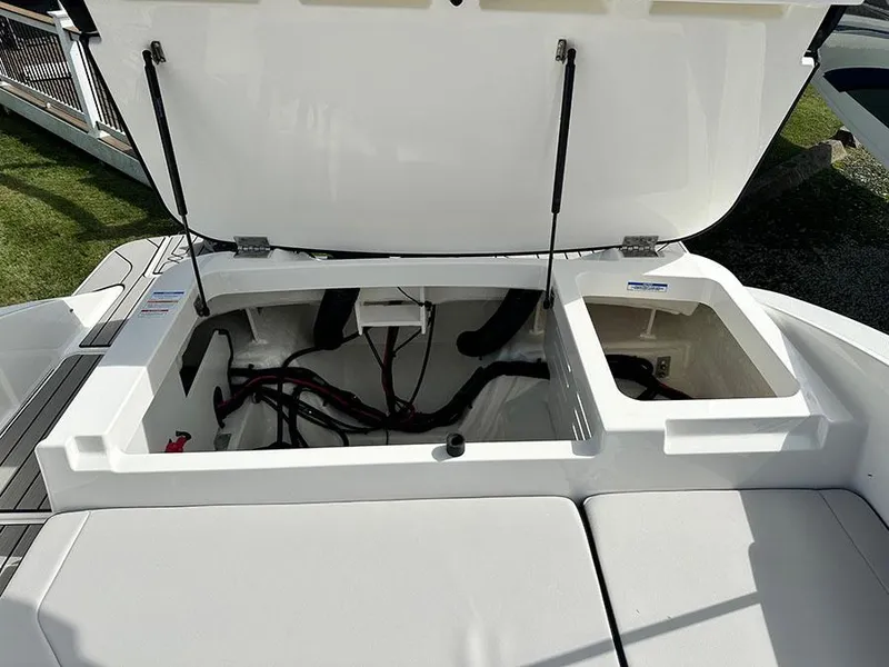 Slide: The Image of Open engine compartment of 2025 Sea Ray SPO 210 boat, showcasing internal components. - 9