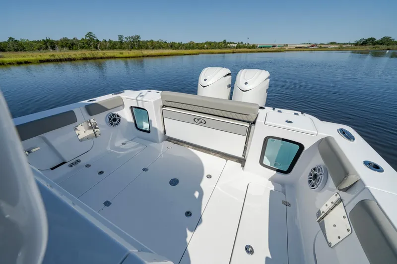Slide: The Image of 2025 Sportsman Open 322 Center Console boat on calm water. - 31