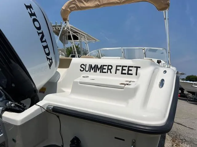 Slide: The Image of Key West 239 DFS boat, 2020 model, with "Summer Feet" name and Honda engine. - 3