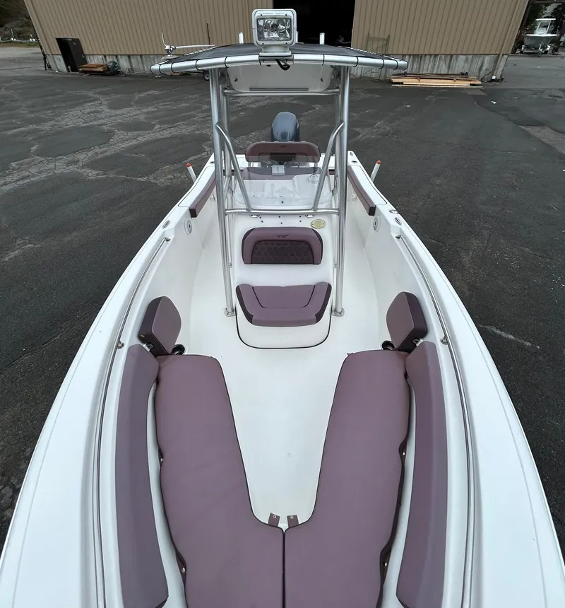 Slide: The Image of 2017 Tidewater 198 CC Adventure boat with spacious seating and sleek design. - 12