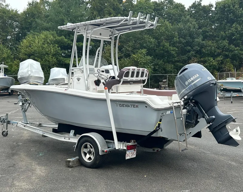 Slide: The Image of 2017 Tidewater 198 CC Adventure boat on trailer with Yamaha outboard motor. - 2