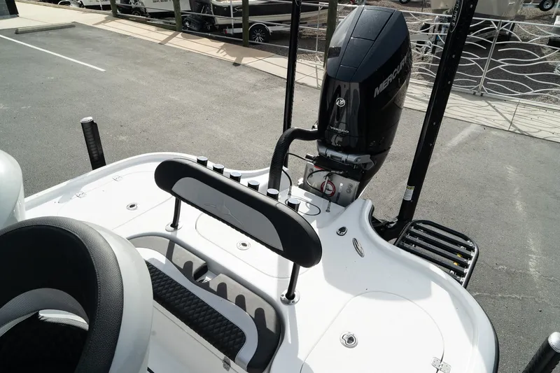 Slide: The Image of 2025 Turner Boatworks 2500 VS with Mercury outboard engine, sleek design, and modern features. - 10