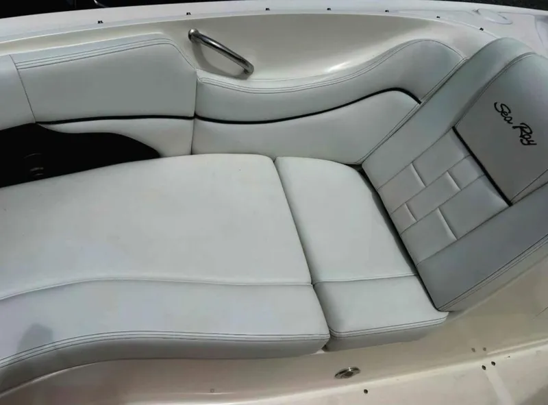 Slide: The Image of Luxurious white seating on a 2015 Sea Ray 300 SLX boat. - 24