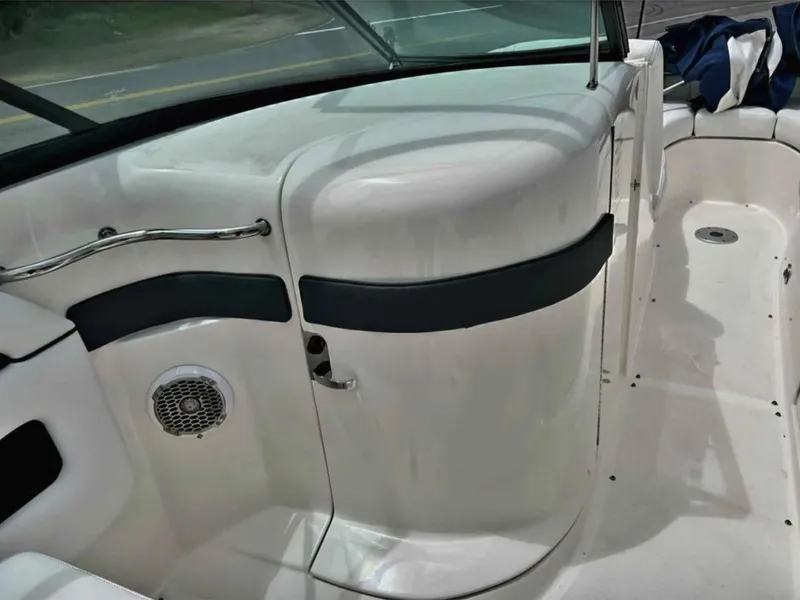 Slide: The Image of 2015 Sea Ray 300 SLX boat interior with sleek white design and seating area. - 29