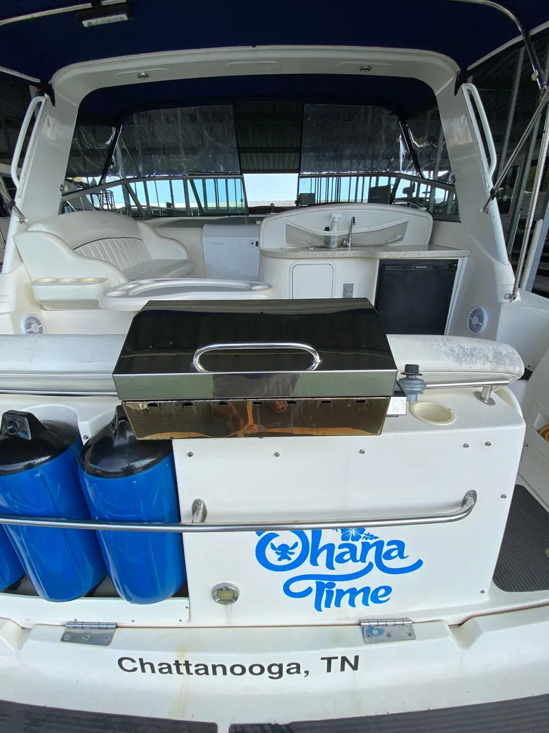 Slide: The Image of 2000 Rinker 340 Fiesta Vee boat with "Ohana Time" text, Chattanooga, TN. - 4