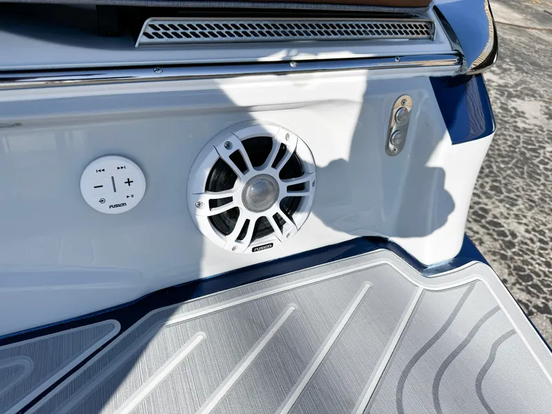 Slide: The Image of 2025 Regal LS6 boat speaker and control panel on deck. - 10