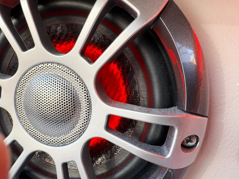 Slide: The Image of Close-up of a Regal LS6 2025 speaker with red LED lighting. - 37