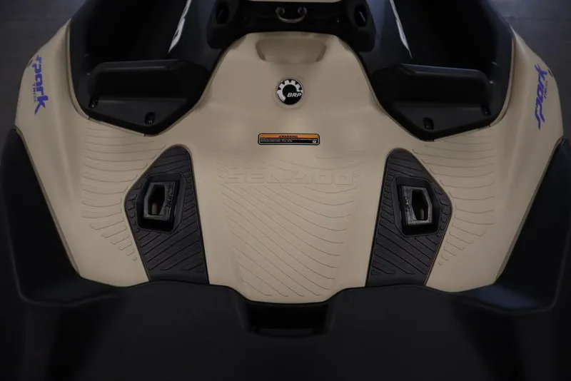 Slide: The Image of 2025 Sea-Doo Spark Trixx jet ski deck, featuring textured footrests and BRP logo. - 15