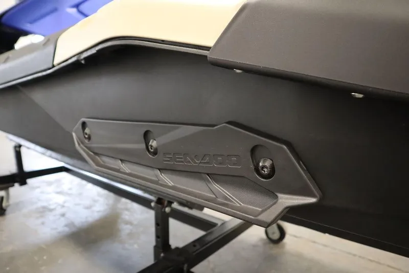 Slide: The Image of 2025 Sea-Doo Spark Trixx jet ski side view, showcasing sleek design and branding. - 16