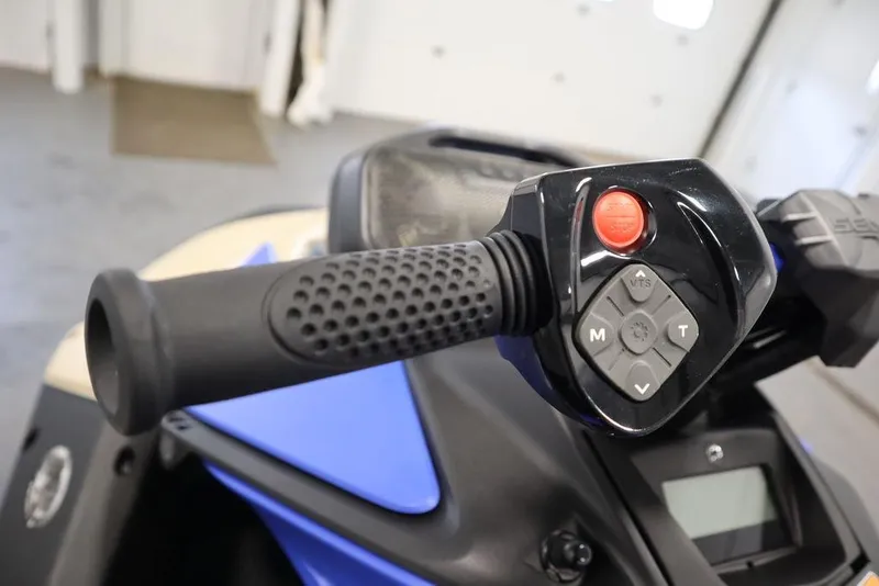 Slide: The Image of Handlebar controls of 2025 Sea-Doo Spark Trixx with audio system and iBR technology. - 4