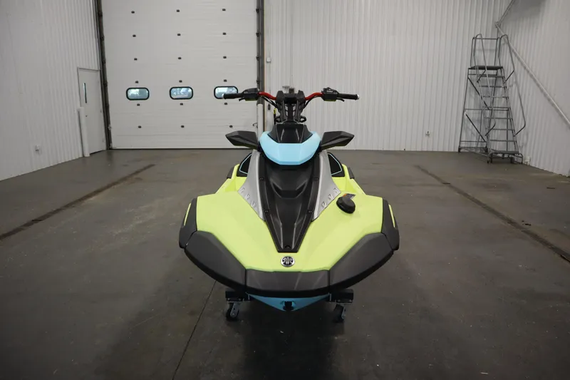 Slide: The Image of 2025 Yamaha WaveRunner JetBlaster PRO 3-Up in a garage, front view. - 2