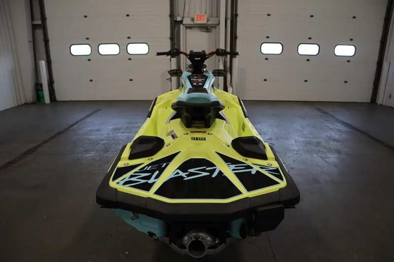 Slide: The Image of 2025 Yamaha WaveRunner JetBlaster PRO 3-Up in a garage, rear view. - 4