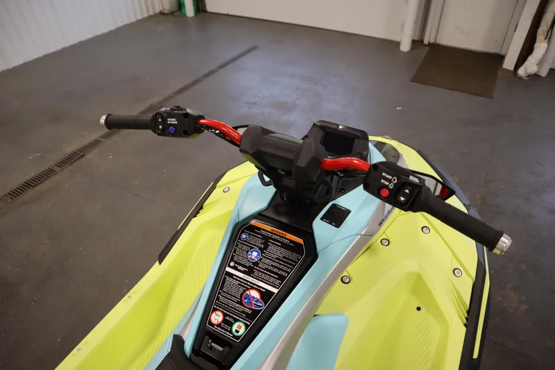 Slide: The Image of 2025 Yamaha WaveRunner JetBlaster PRO 3-Up handlebars in a garage setting. - 5