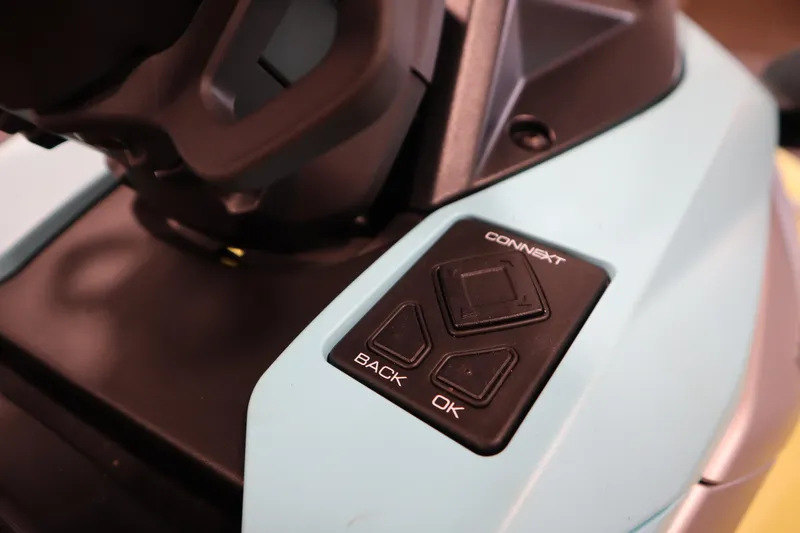 Slide: The Image of Close-up of 2025 Yamaha WaveRunner JetBlaster PRO 3-Up control panel with buttons. - 7