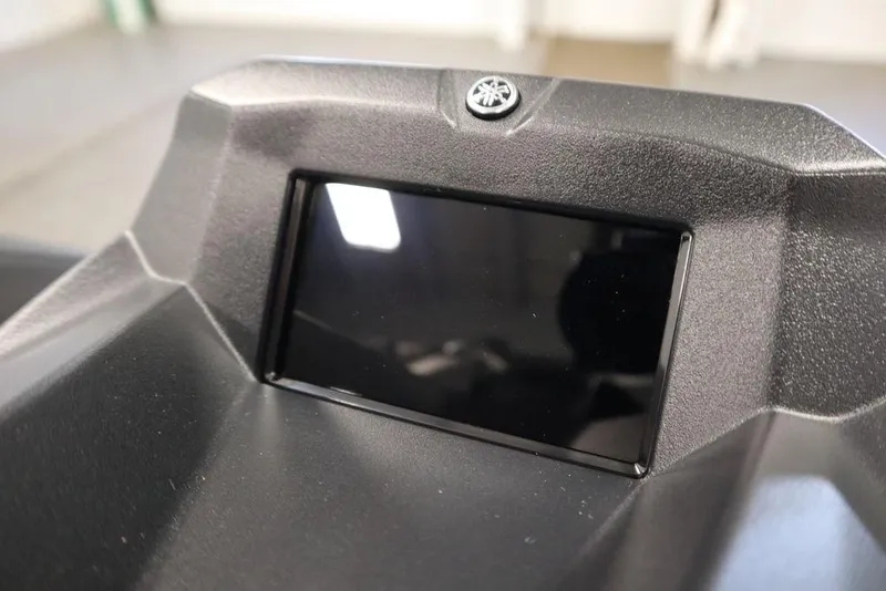 Slide: The Image of Handlebar controls of 2025 Yamaha WaveRunner JetBlaster LTD in a garage setting. - 20