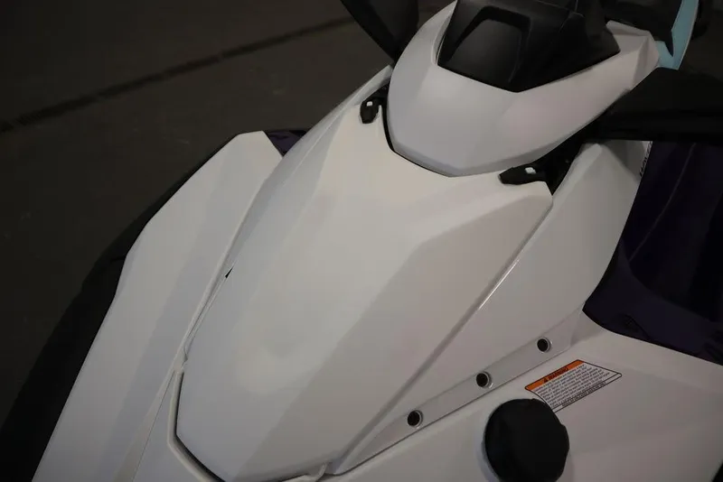 Slide: The Image of 2025 Yamaha WaveRunner JetBlaster LTD in purple and white, displayed indoors. - 27