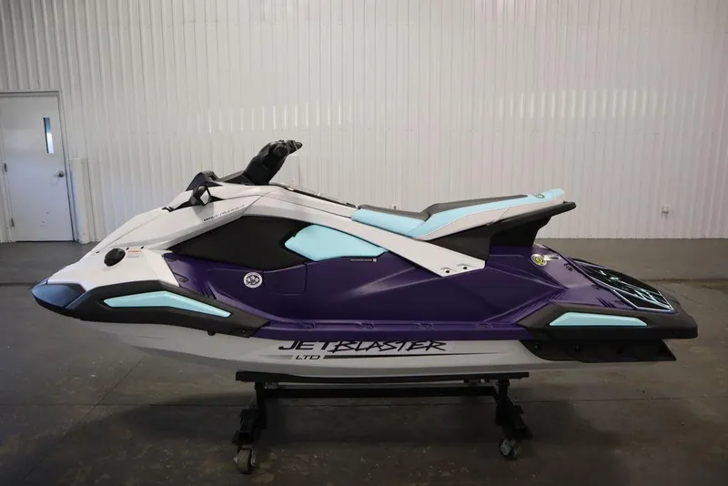 Slide: The Image of 2025 Yamaha WaveRunner JetBlaster LTD in a garage, showcasing sleek purple design. - 28