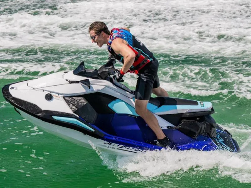 Slide: The Image of 2025 Yamaha WaveRunner JetBlaster LTD handlebar and mirror detail, showcasing sleek design. - 7