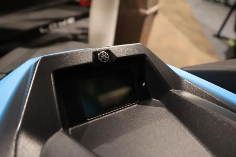 Slide: The Image of 2025 Yamaha WaveRunner JetBlaster DLX 3-Up, red and blue, side mirror view. - 4