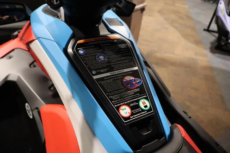 Slide: The Image of 2025 Yamaha WaveRunner JetBlaster DLX 3-Up, vibrant red and blue design, top view. - 7