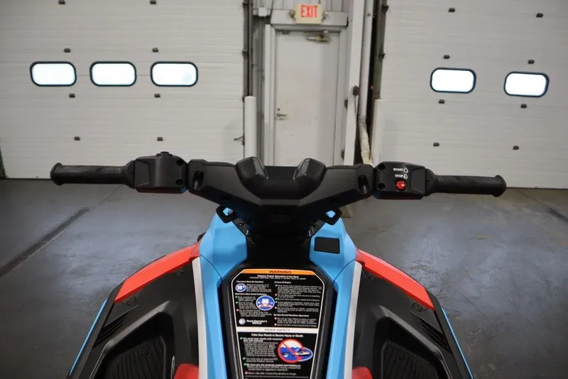 Slide: The Image of 2025 Yamaha WaveRunner JetBlaster DLX 2-Up handlebars in a garage setting. - 10
