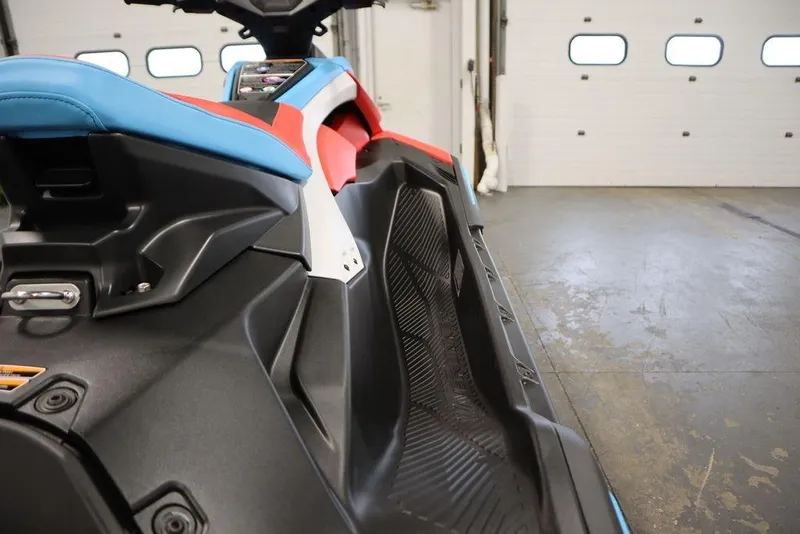 Slide: The Image of 2025 Yamaha WaveRunner JetBlaster DLX 2-Up in a garage, showcasing sleek design and vibrant colors. - 15