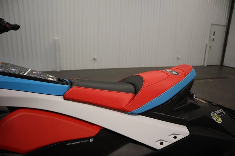 Slide: The Image of 2025 Yamaha WaveRunner JetBlaster DLX 2-Up with vibrant red and blue seat design. - 18