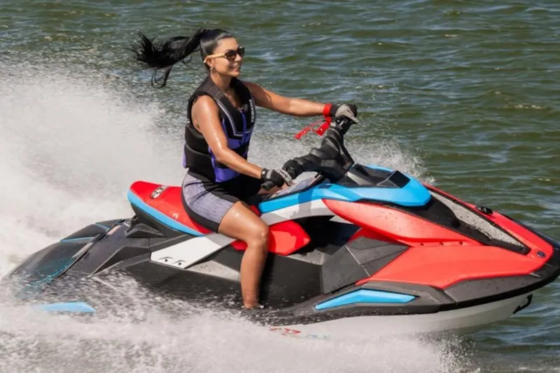 Slide: The Image of Woman riding 2025 Yamaha WaveRunner JetBlaster DLX 2-Up on water. - 24