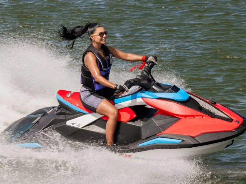 Slide: The Image of 2025 Yamaha WaveRunner JetBlaster DLX 2-Up in vibrant red and blue design. - 4