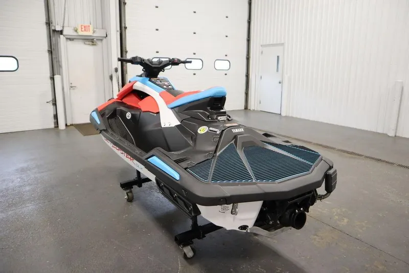 Slide: The Image of 2025 Yamaha WaveRunner JetBlaster DLX 2-Up in a garage, showcasing sleek design and vibrant colors. - 9