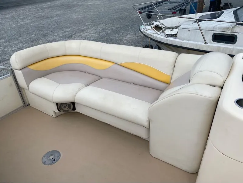 Slide: The Image of Godfrey AP 240 boat seating, 2012 model, with beige and yellow upholstery. - 3