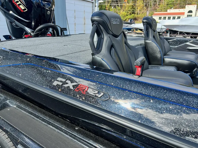Slide: The Image of 2025 Skeeter FXR21 LE boat with sleek design and comfortable seating. - 18