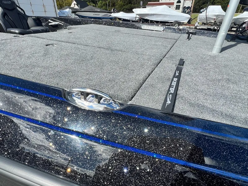 Slide: The Image of 2025 Skeeter FXR21 LE boat with sparkling finish and spacious deck. - 23