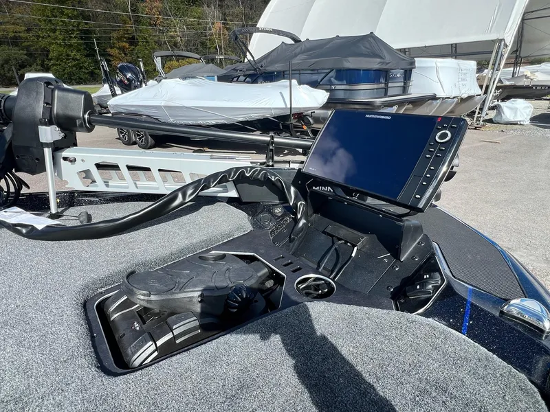 Slide: The Image of 2025 Skeeter FXR21 LE boat dashboard with advanced navigation system. - 3