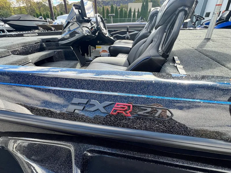 Slide: The Image of 2025 Skeeter FXR21 LE boat interior with sleek design and comfortable seating. - 31