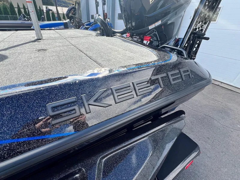 Slide: The Image of 2025 Skeeter FXR21 LE boat, sleek design with metallic finish. - 35
