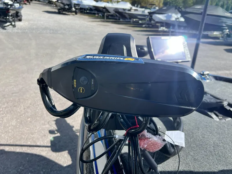 Slide: The Image of Close-up of 2025 Skeeter FXR21 LE boat equipment in a marina setting. - 9